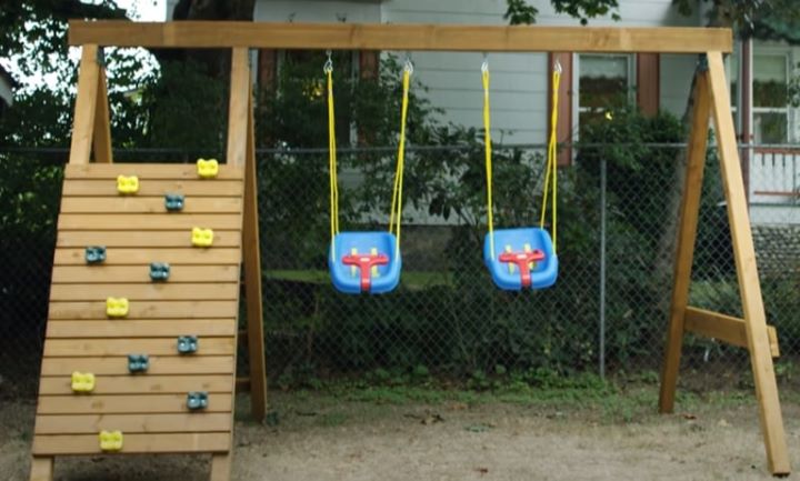 Observing the attractive design of the wooden swing sets